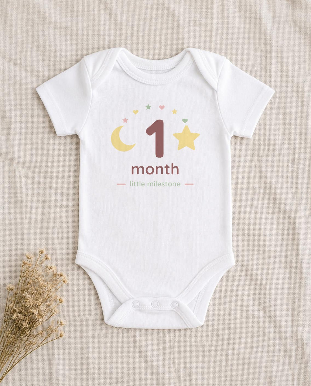 1 month design pressed on a white baby bodysuit