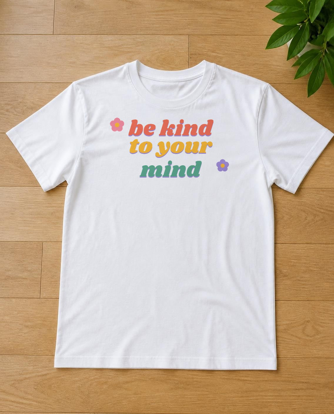 Be Kind To Your Mind design on a white tee