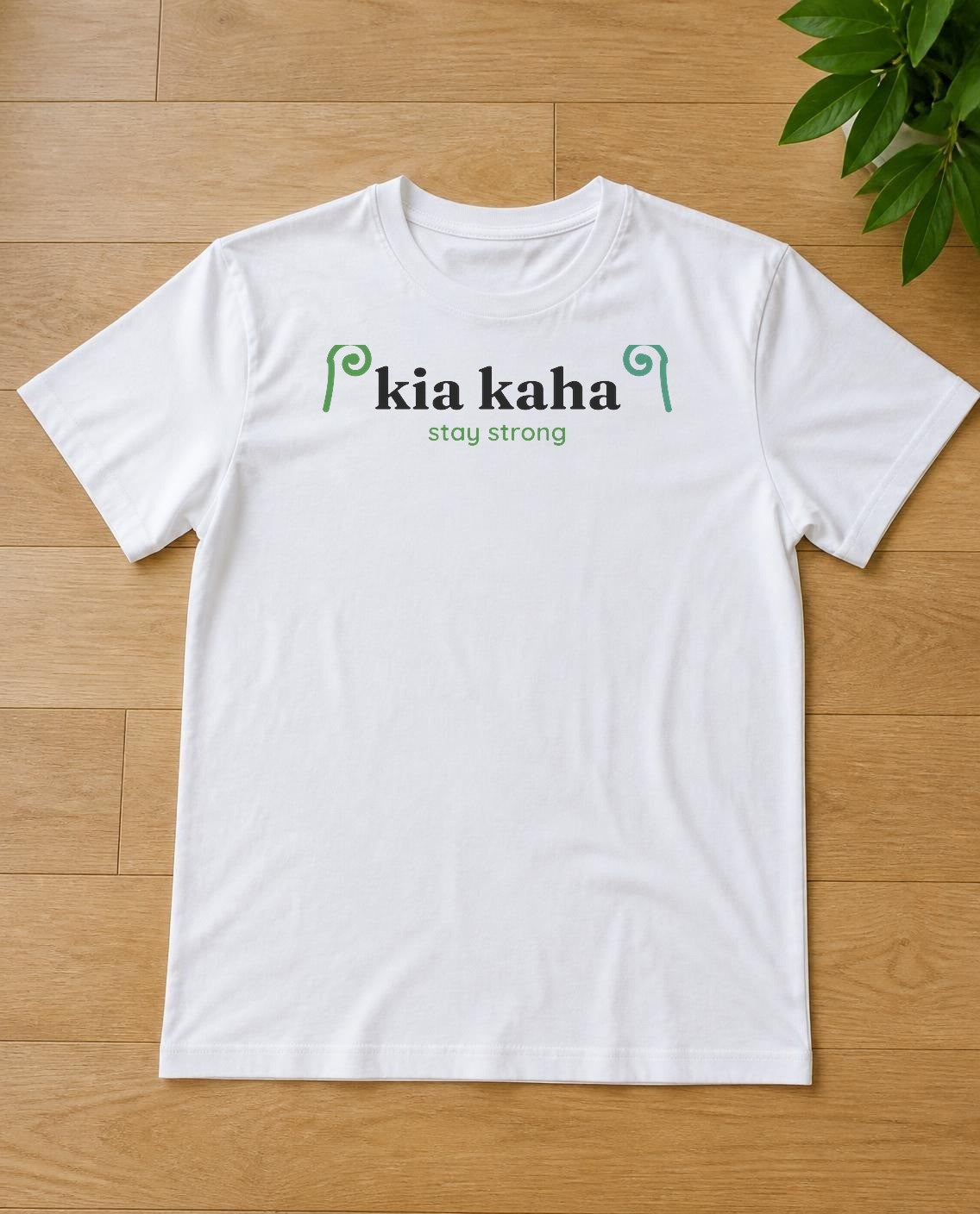 Kia Kaha design on a white tee
