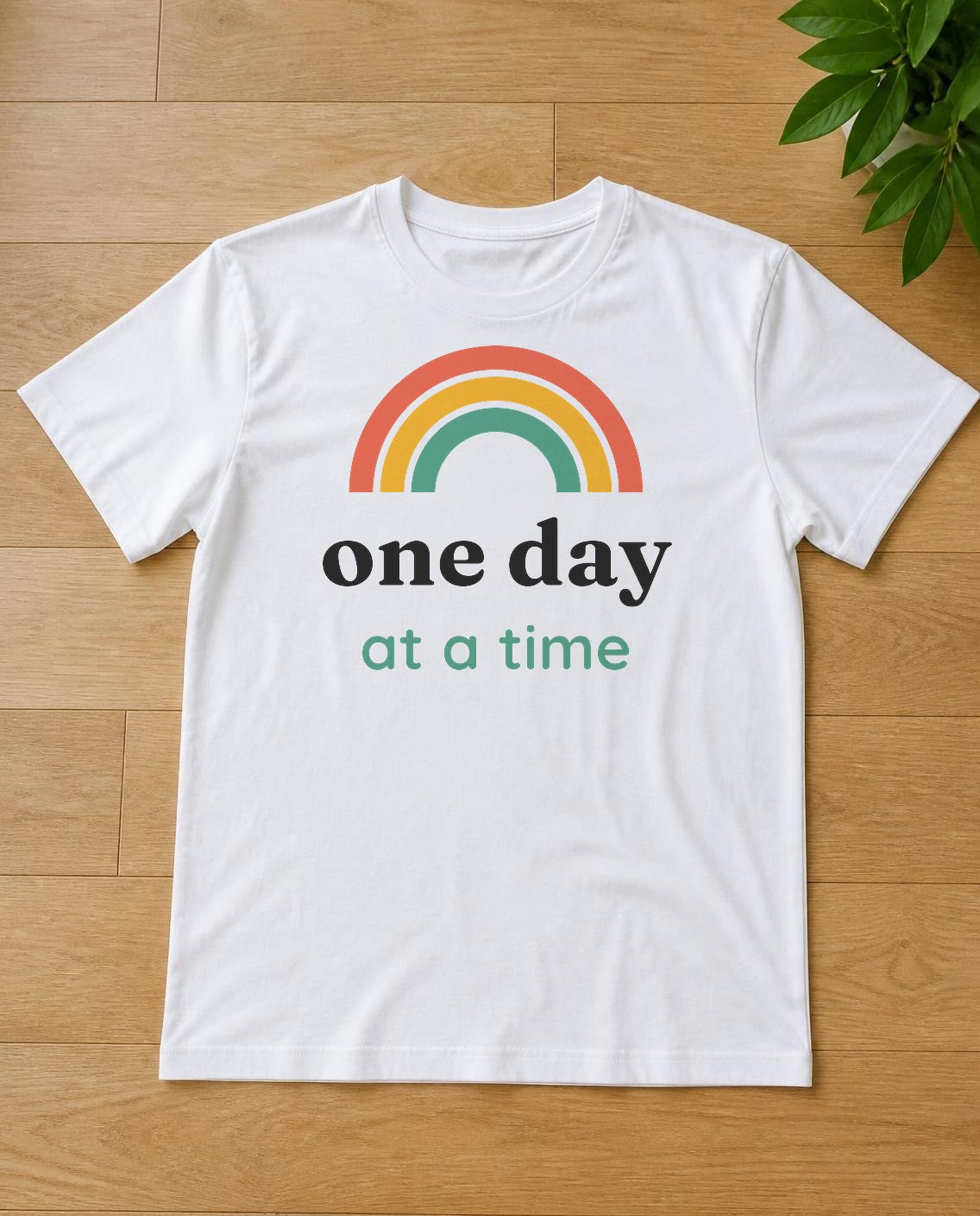 One Day At A Time design on a white tee