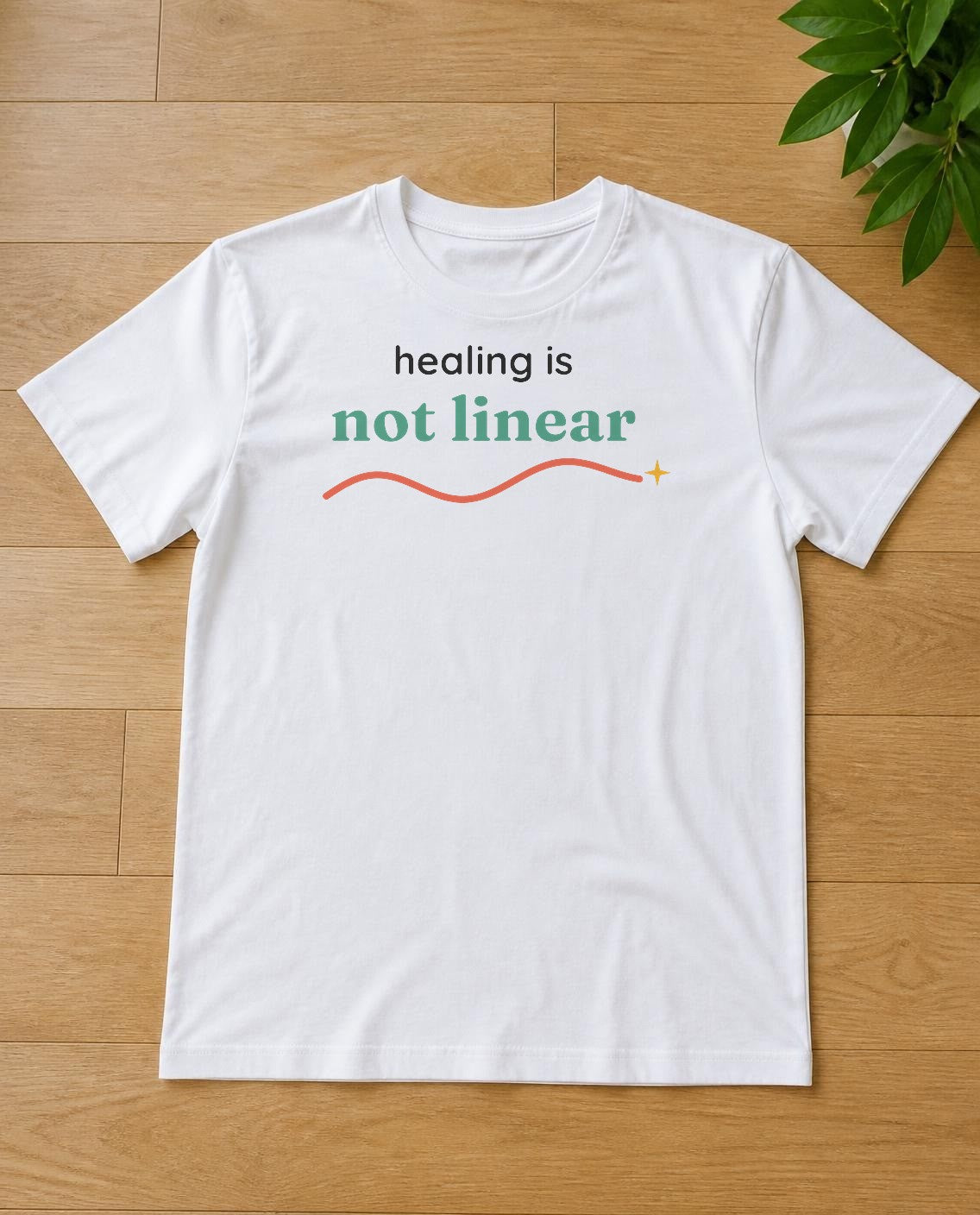 Healing is not linear design on a white tee